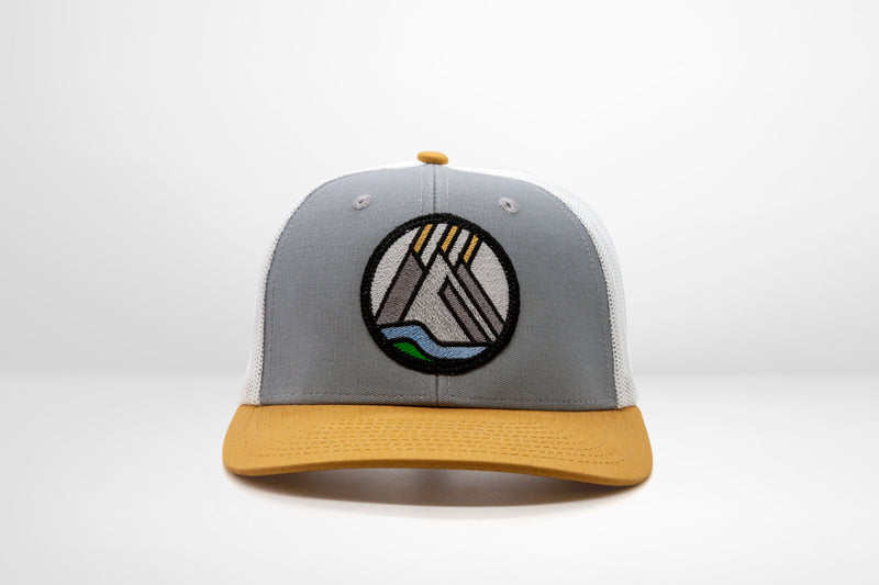 Geometric Mountains Patch on a Ponytail Trucker Snap Back - Blue - Grey - White - Black